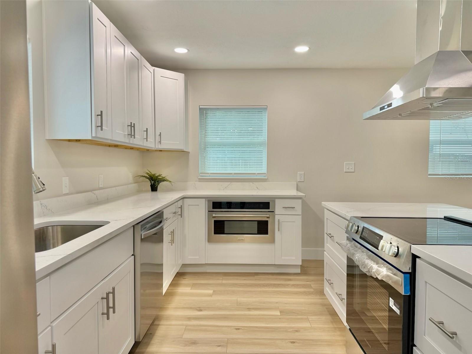 Extra wide galley kitchen with island