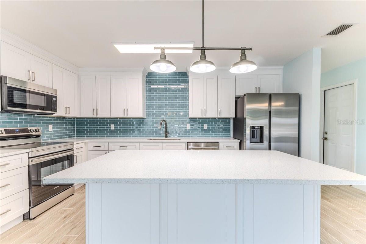 Island Breakfast Bar with Pendent Lights