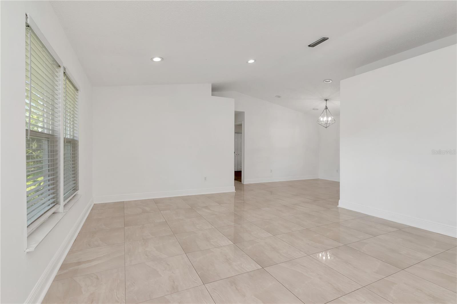 Beautiful open-concept living space designed for both comfort and functionality—perfect for family gatherings and entertaining.