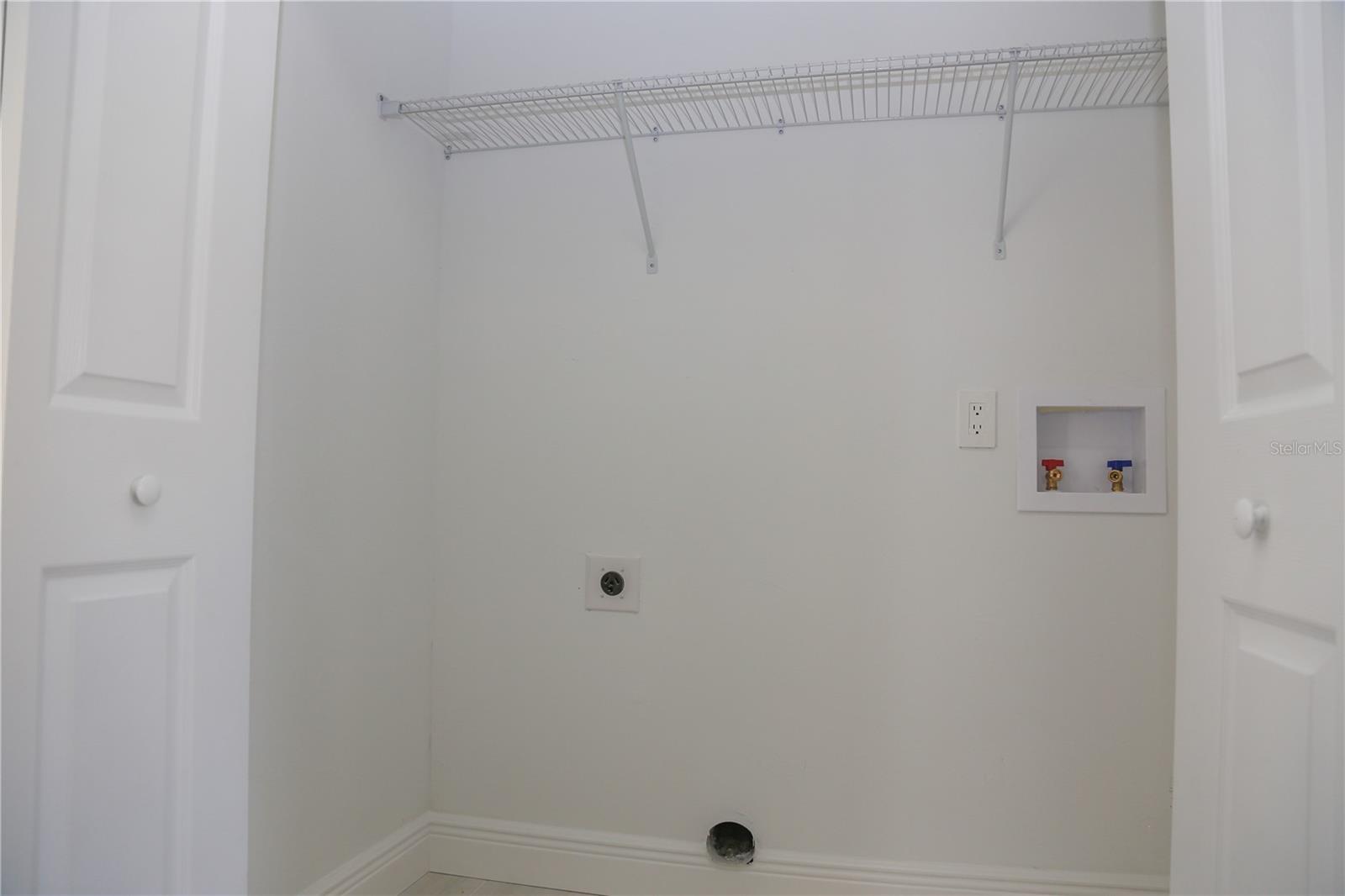 Laundry closet is adjacent to second bathroom