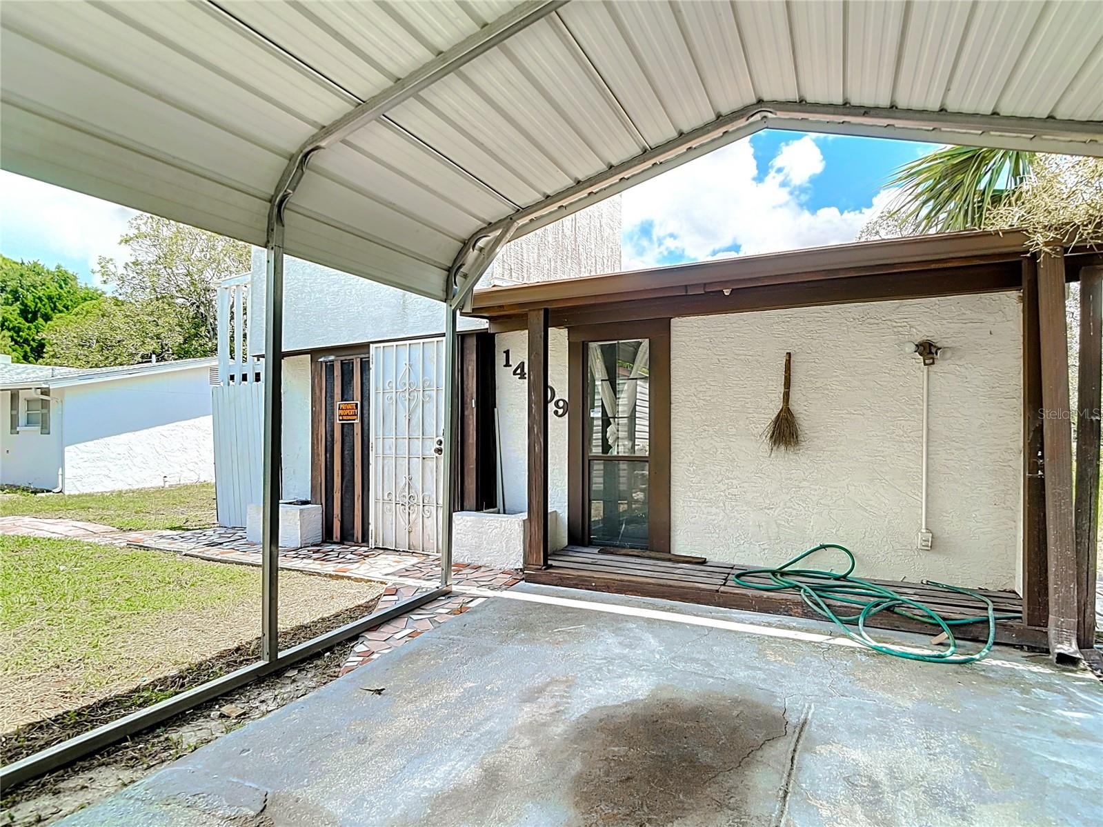 Large carport can cover at least 2 cars comfortably - probably more