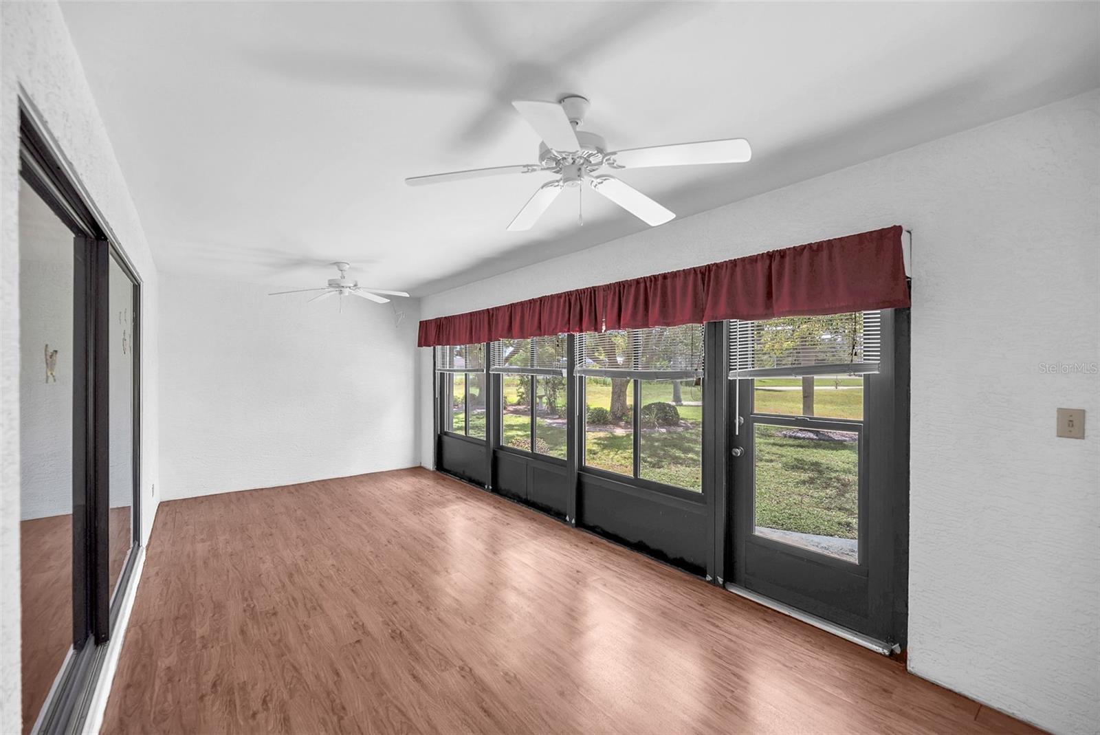 Rear of the house has an enclosed porch.