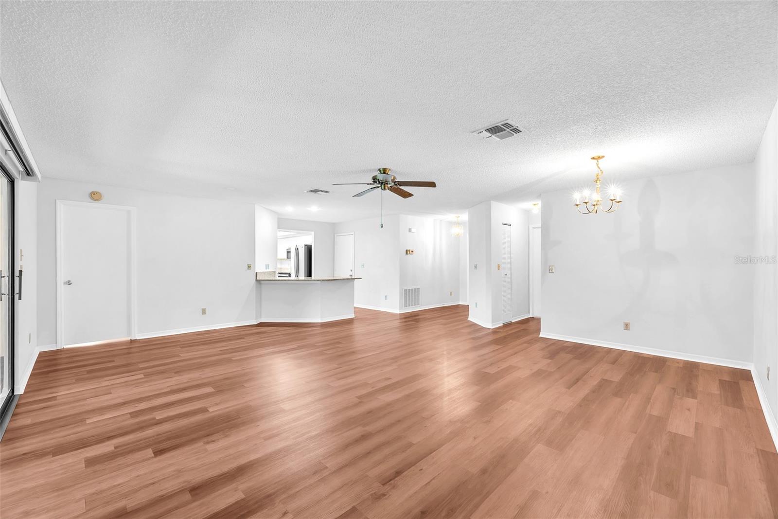 The kitchen has stainless steel appliances and granite countertops.