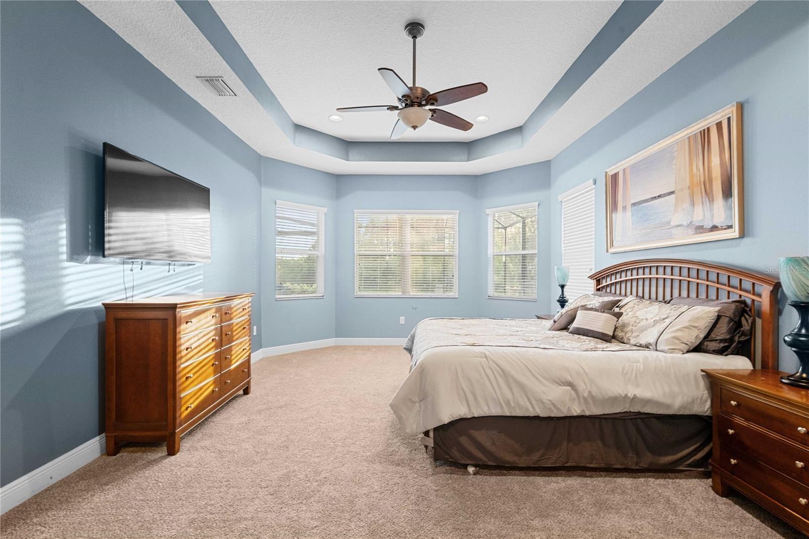 Primary Bedroom with view of pool