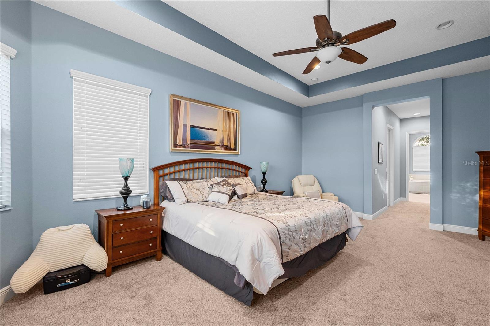 Primary bedroom with view of double walk in closets