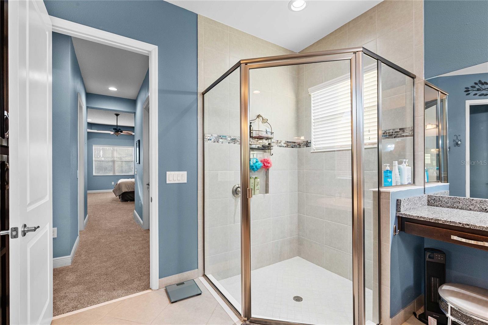 Primary bathroom with view of Primary suite