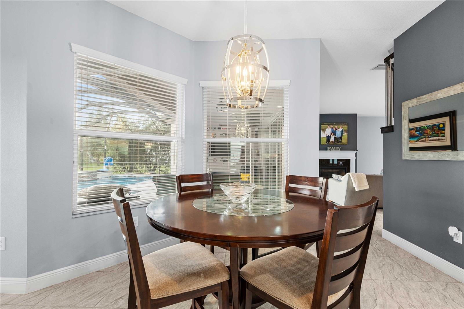 Breakfast nook with view of pool