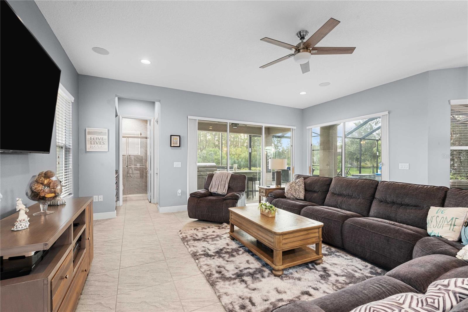 Family room with view of full bath and bar nook