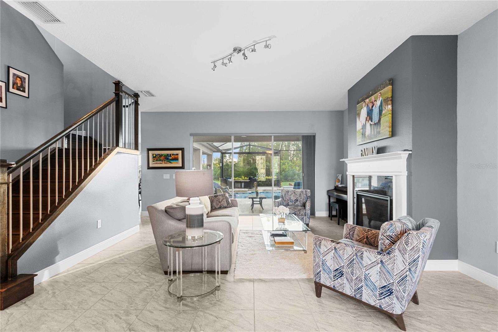 Living room with view of pool