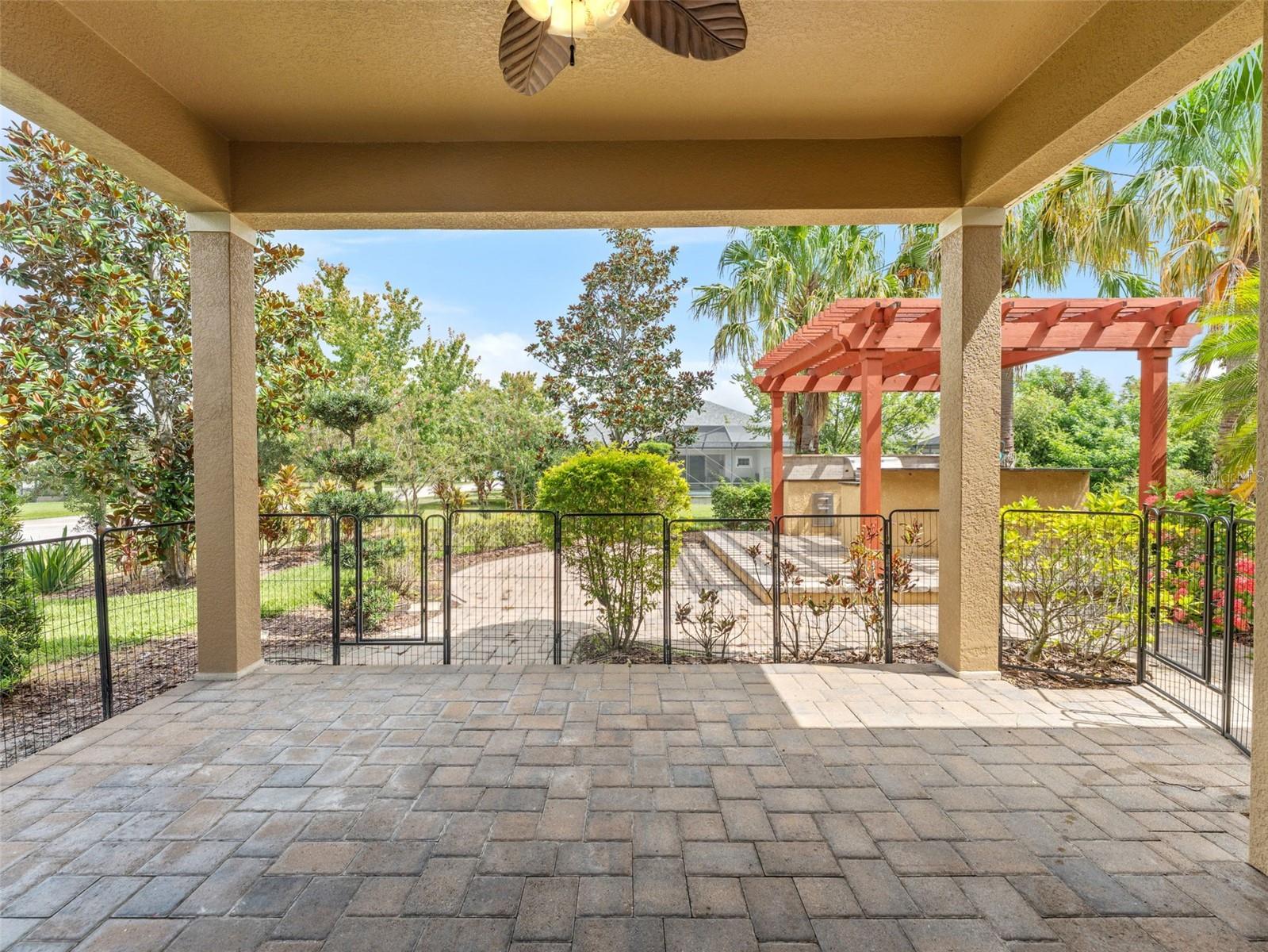 Back Deck with Ceiling Fan and Partly Fenced for any of your Furry Friends!