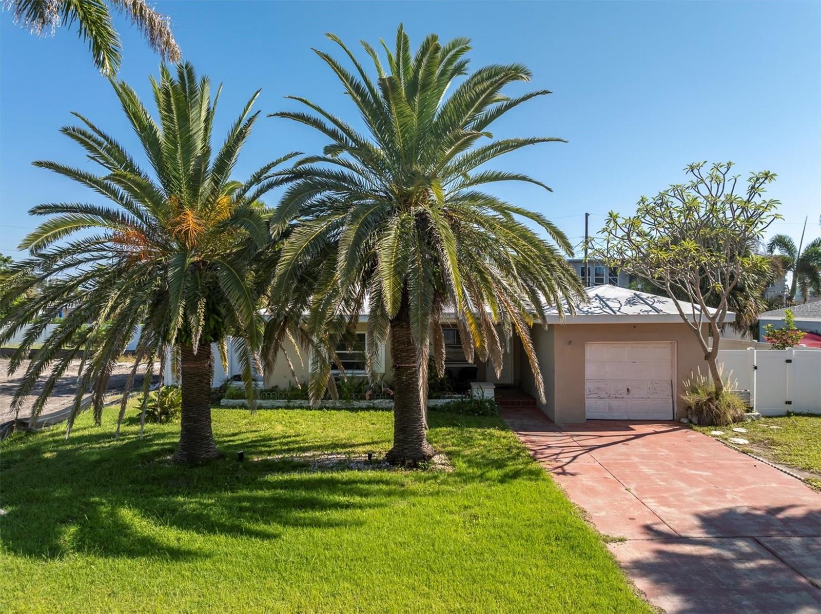 Beautiful Palms framing property