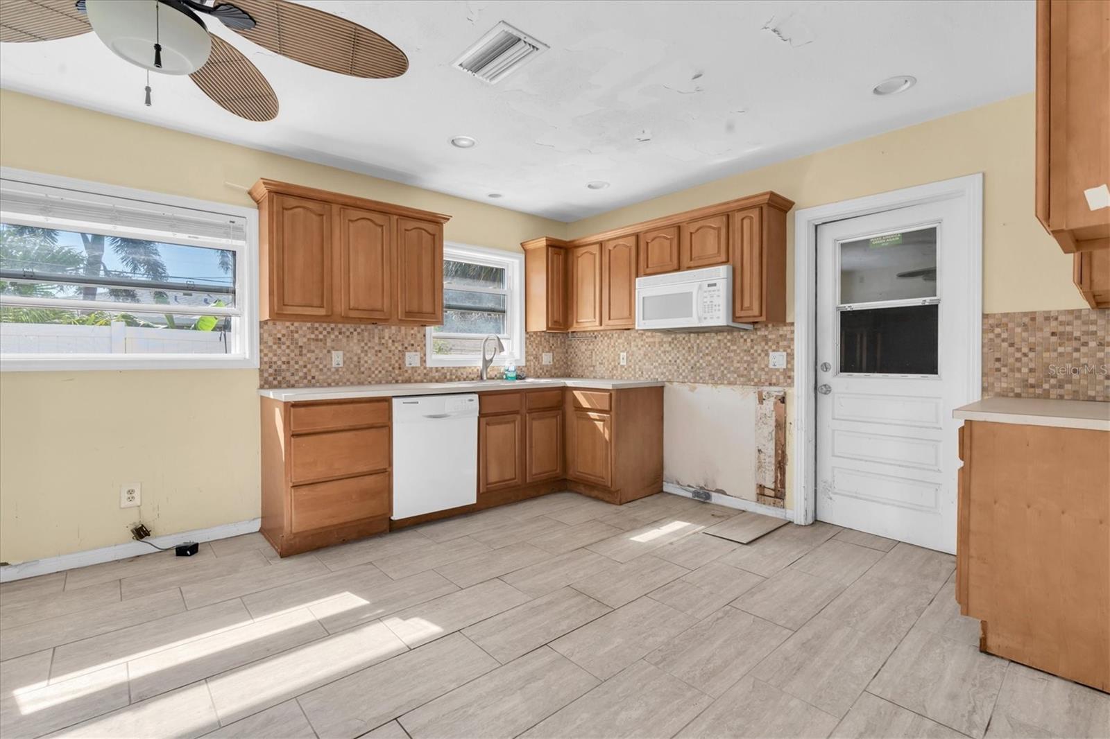 Kitchen with door to garage