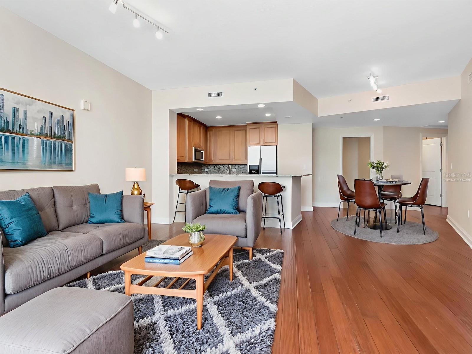 Virtually staged.  Living/dining area