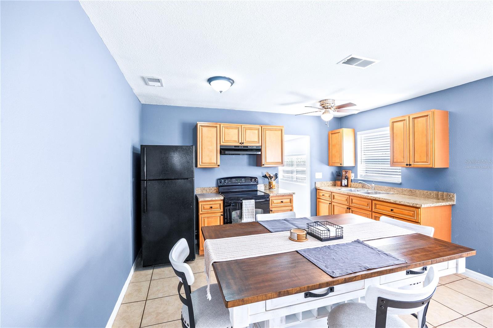 Dining to Kitchen View. Virtually staged.