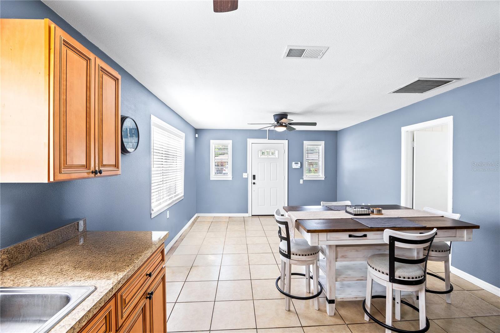 Kitchen to Dining View. Virtually staged.