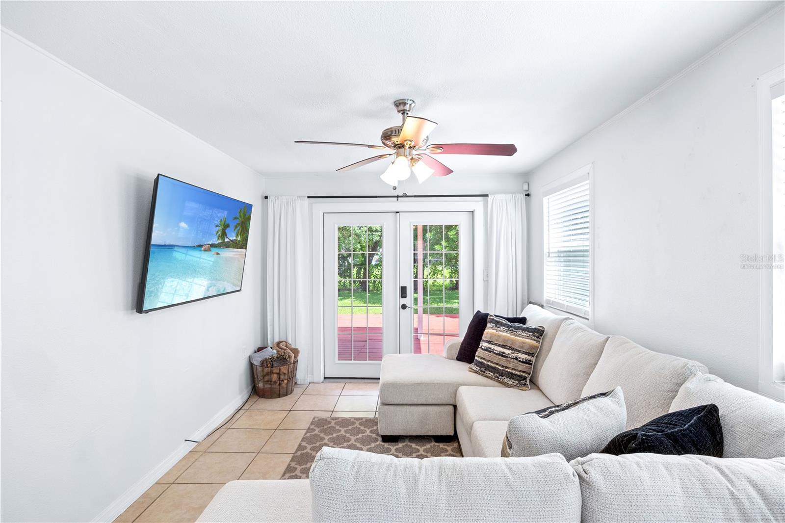 Living Room to Back of Home. Virtually staged.
