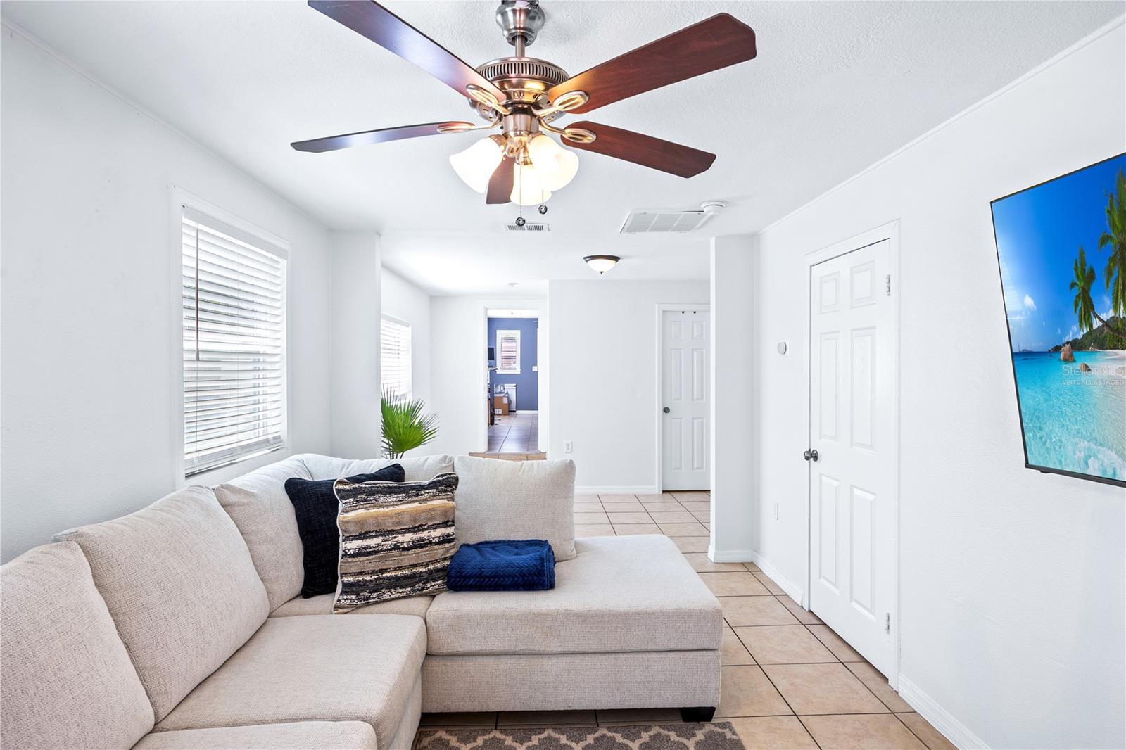 Living Room to Front of Home. Virtually staged.