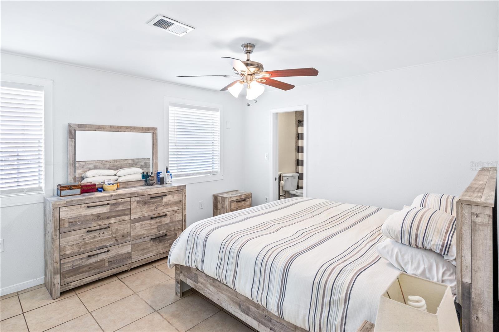 Primary Suite Bedroom. Virtually staged.