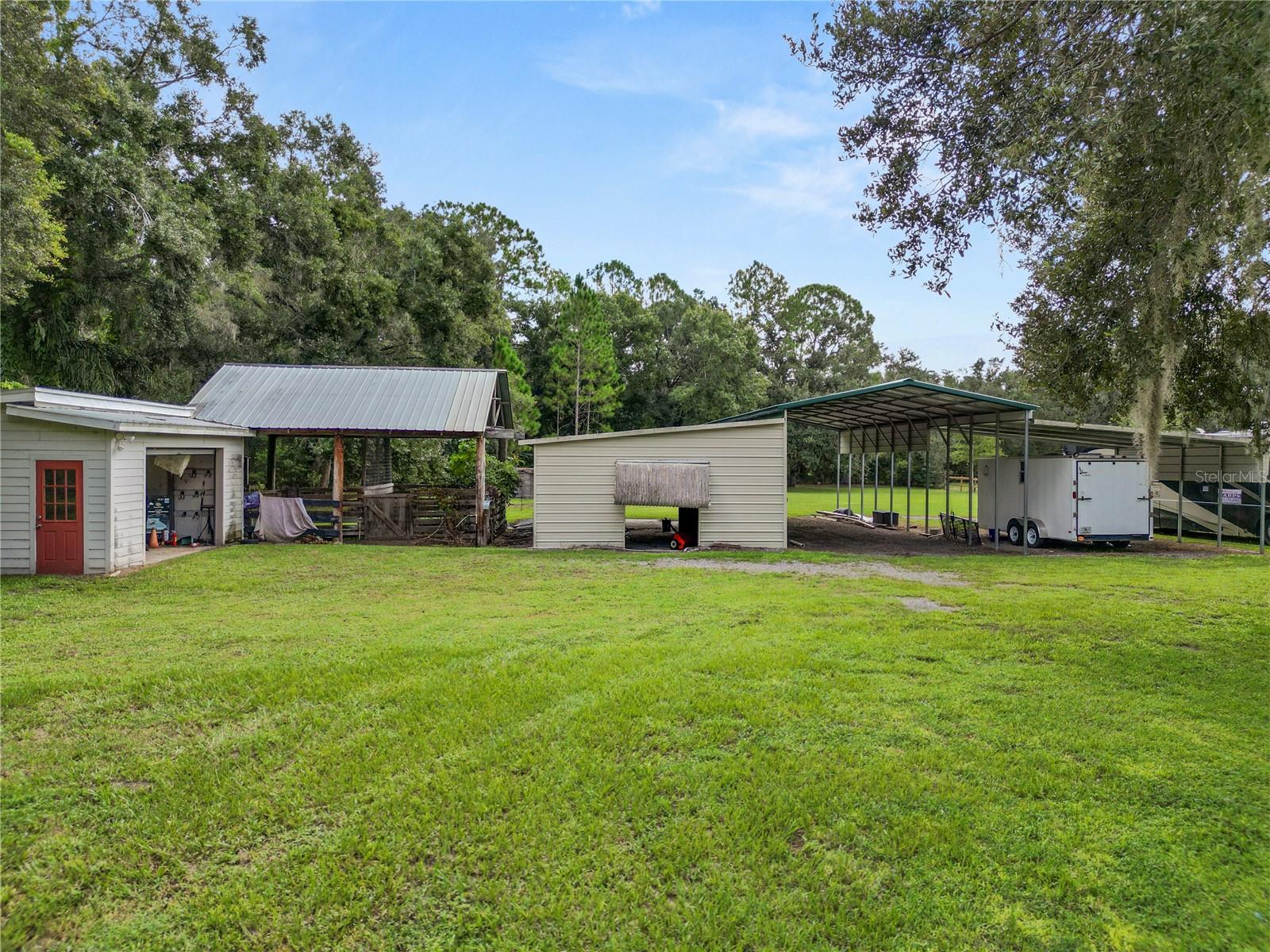 from left to right: garage, two stall barn, workshop, two car ports