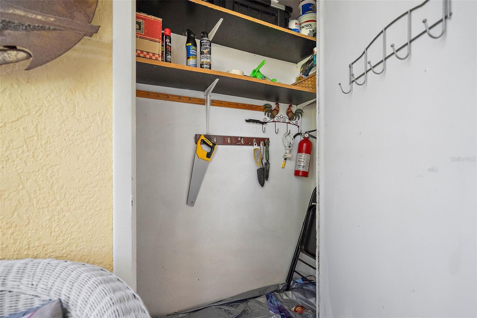 Storage closet in outside screened patio