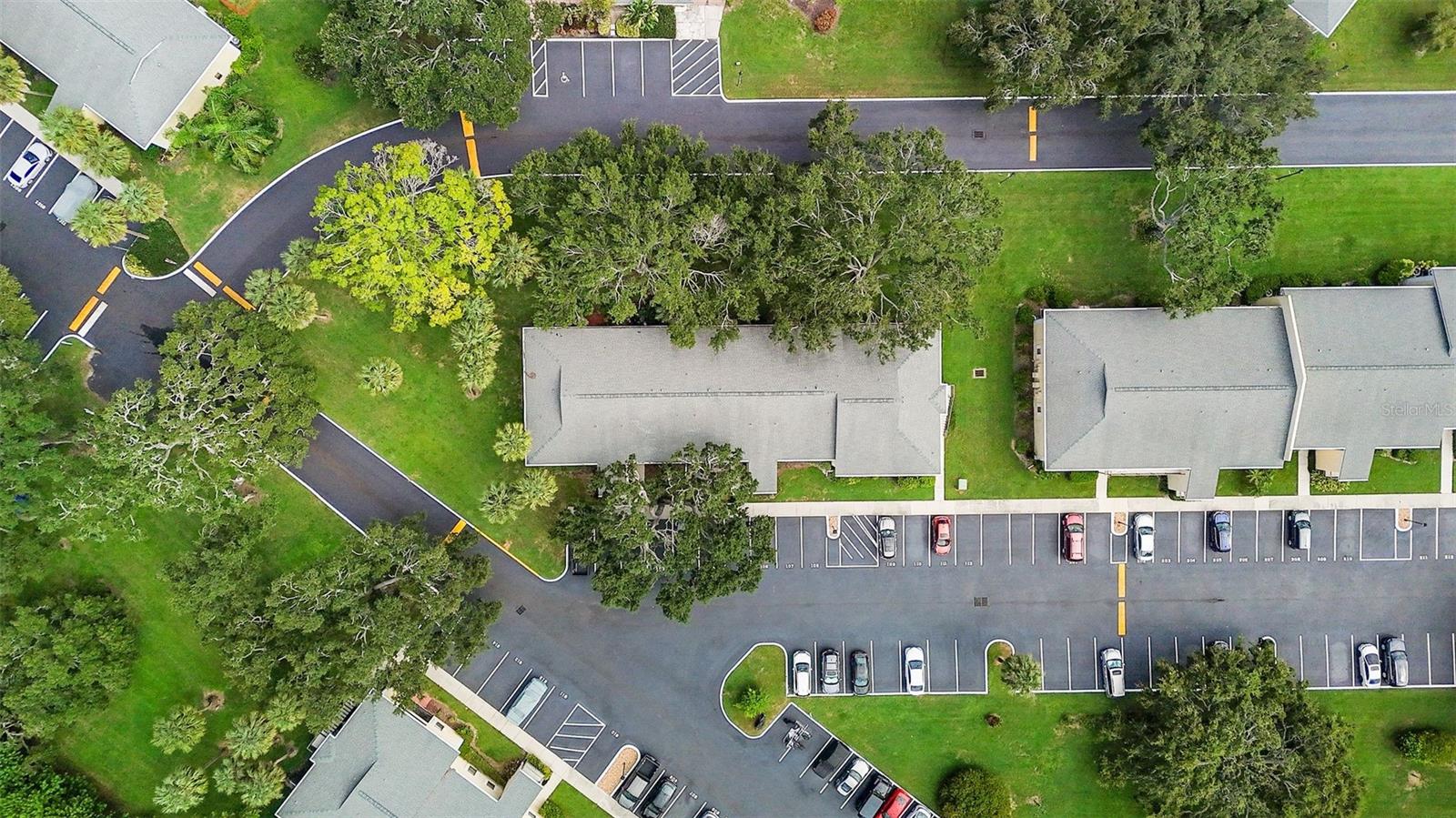 Unit is in the first building across from the pool.