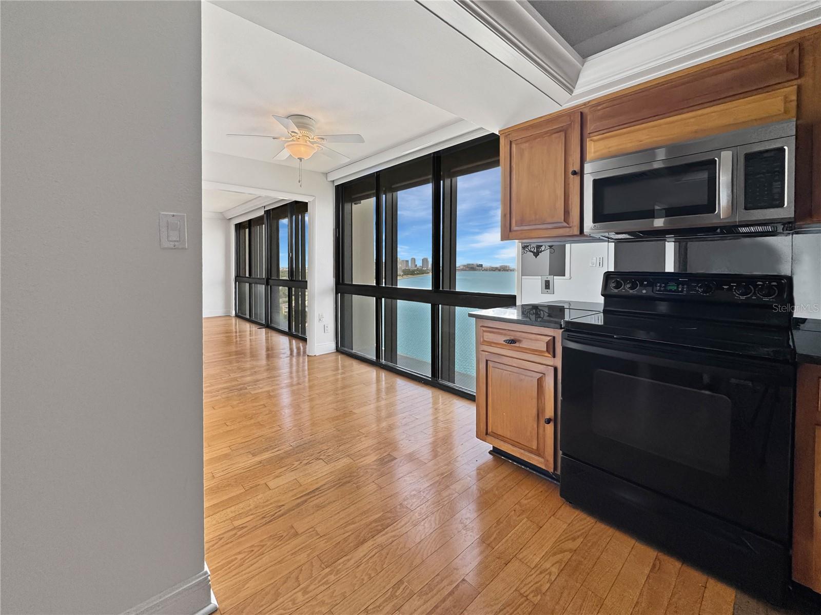 Kitchen flows into a breakfast nook.