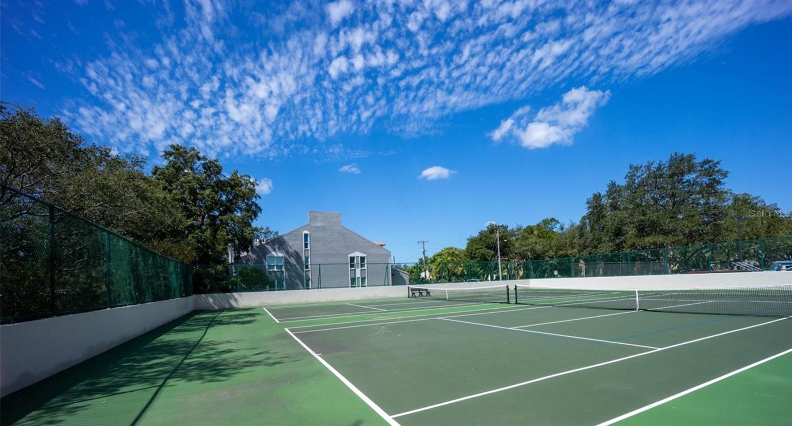Two tennis/pickleball courts.