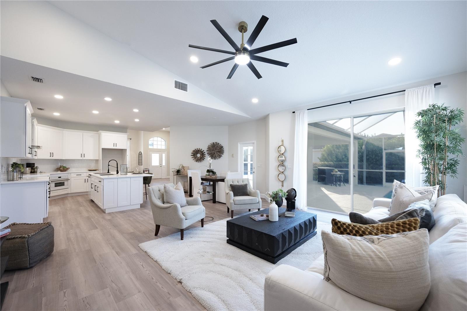HUGE family room with lots of natural light and GOLF course views