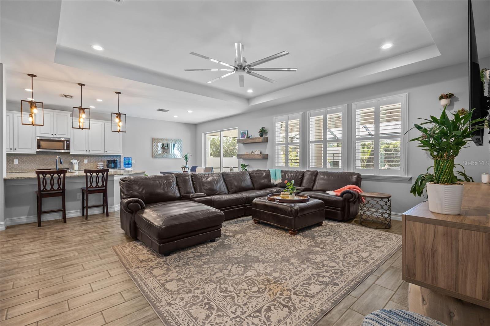 Living room open to both dining and kitchen