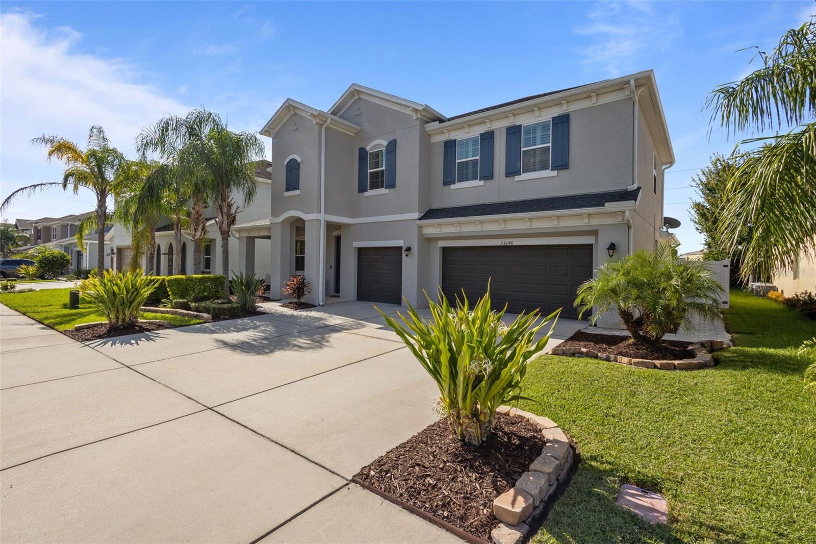 Home has 3 car garage and beautiful exterior