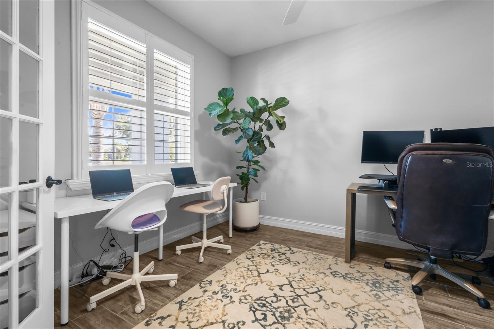 Office with french doors just to your left when you enter home