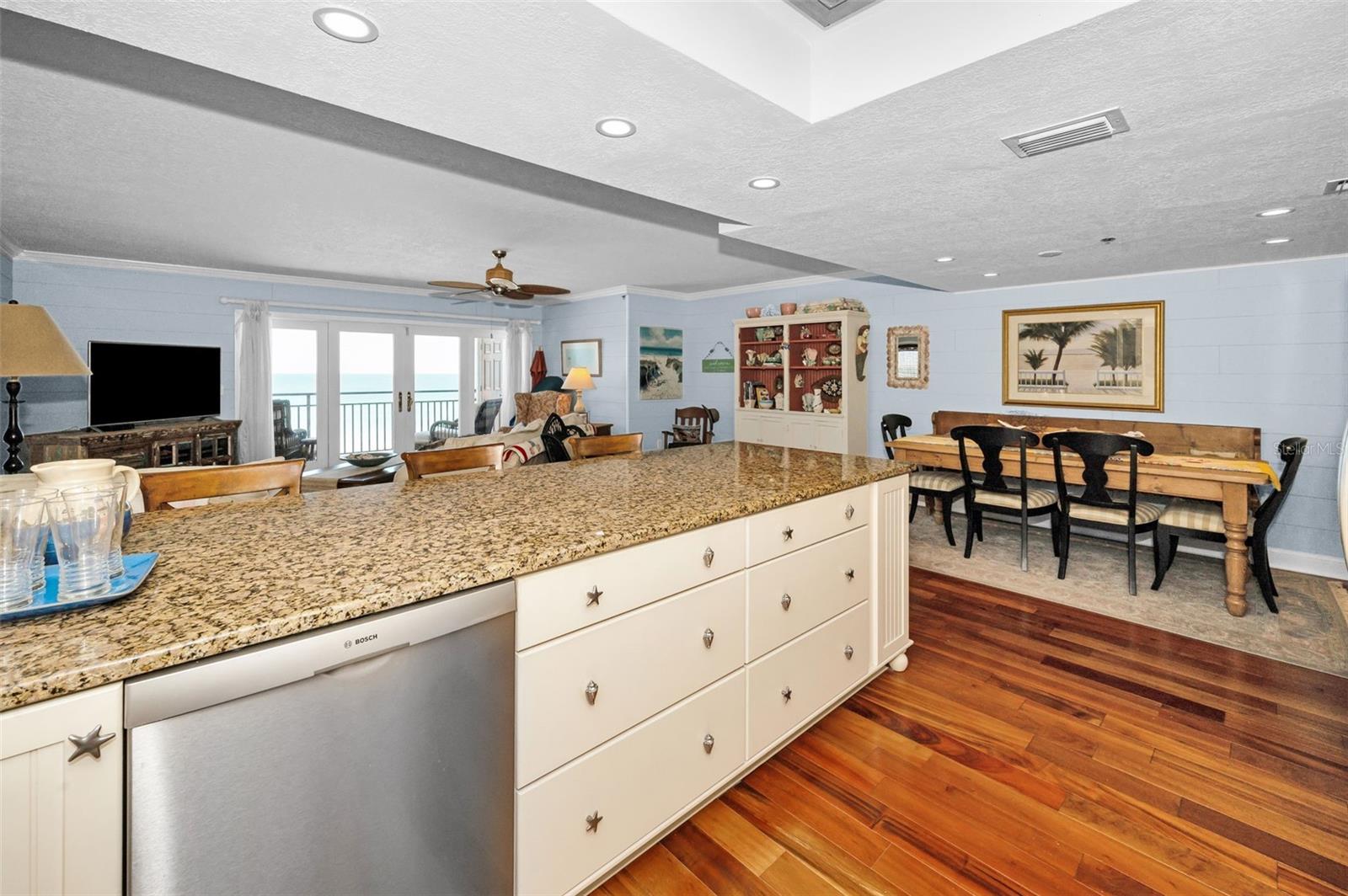... Enjoy The Water View While Cooking & Handling The Prep Work.. Large Great Room Area Allows the Cook or Cooks to Interact With Guests And Enjoy Themselves -  Everyone Knows - Who Controls the Kitchen - Controls The Household. . Dishwasher on Left in Photo..