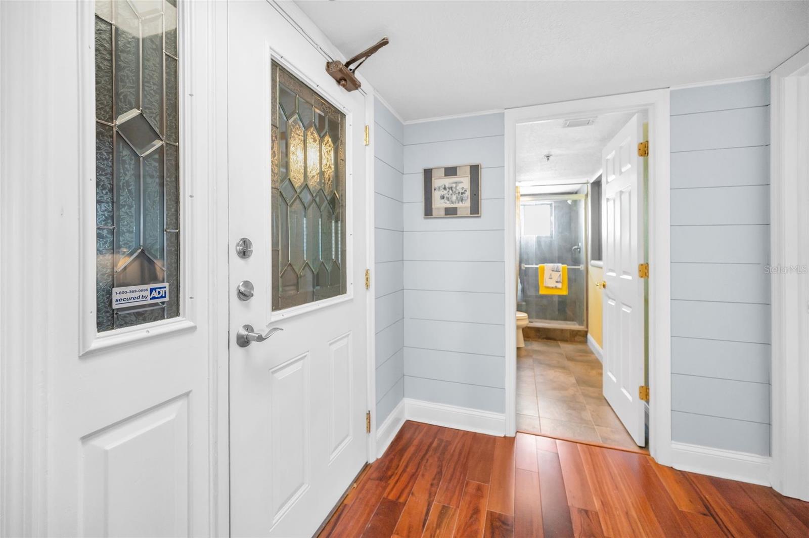 .. Shoot of Unit Foyer By Entry Door. Foyer is 11 X 6 .. Updated Hallway Bath 11.3 X 5.4 Services Guest Bedroom # 2 on Right and Common Area in Unit.