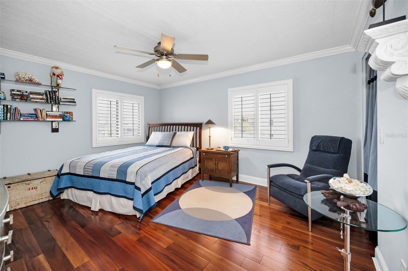 .. Guest Bedroom # 2..Size 14.11 X 12.10.. Plantation Shutters - 4' X 5' Walk In Closet on Right.