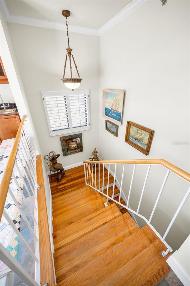 ... Hand Crafted Stairs Leading to Upper Floor ..  Six Steps and a Landing - Not Bad. Owner Has Every Room or Space Nicely Decorated - If it's Your Style - You won't have to make any changes.