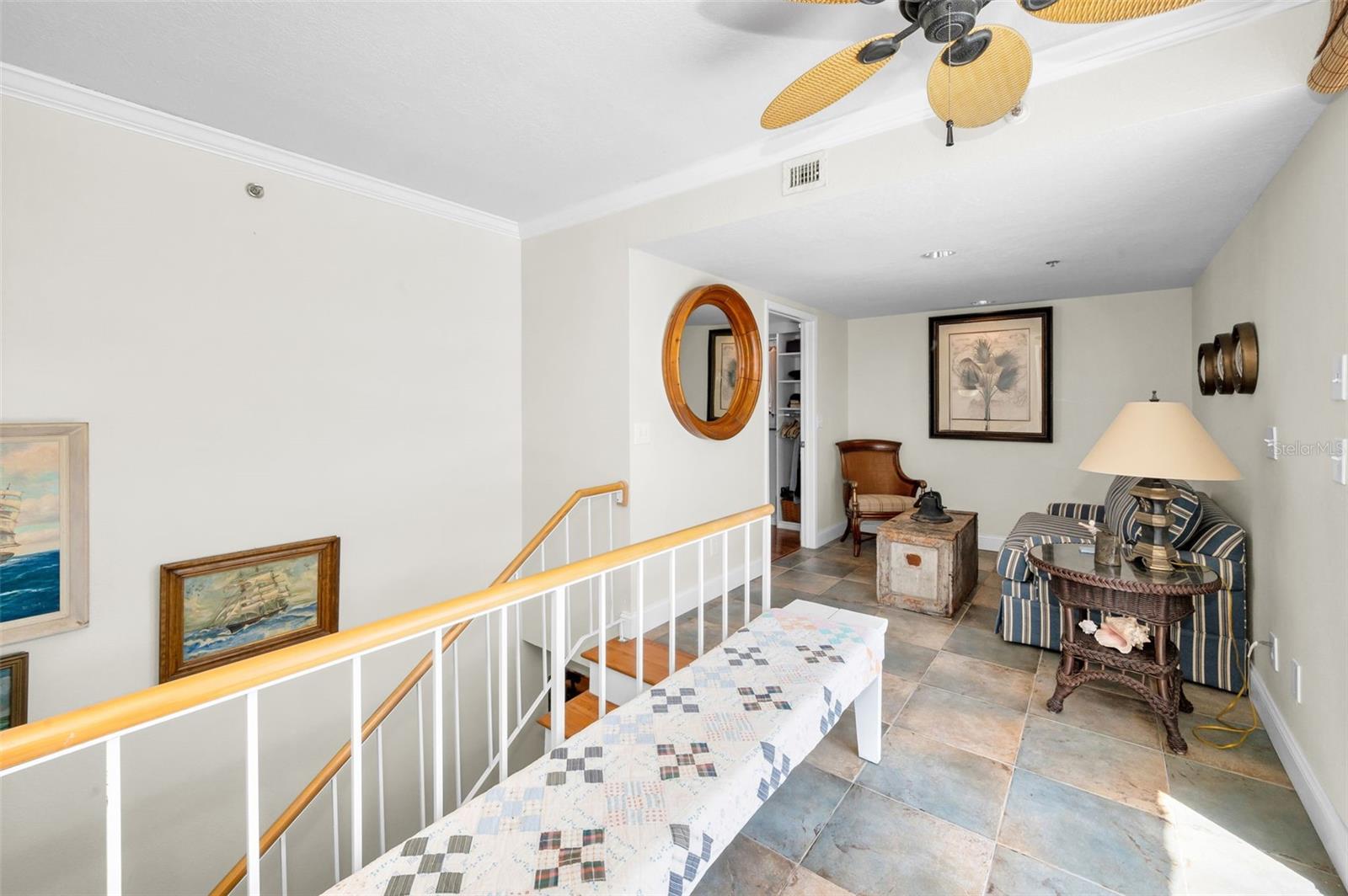 .. This Parlor Room on Top Floor Landing is extremely Popular When Entertaining on Roof Top Patio / Deck . Owners Master Suite is Accessed Thru Door on Left.