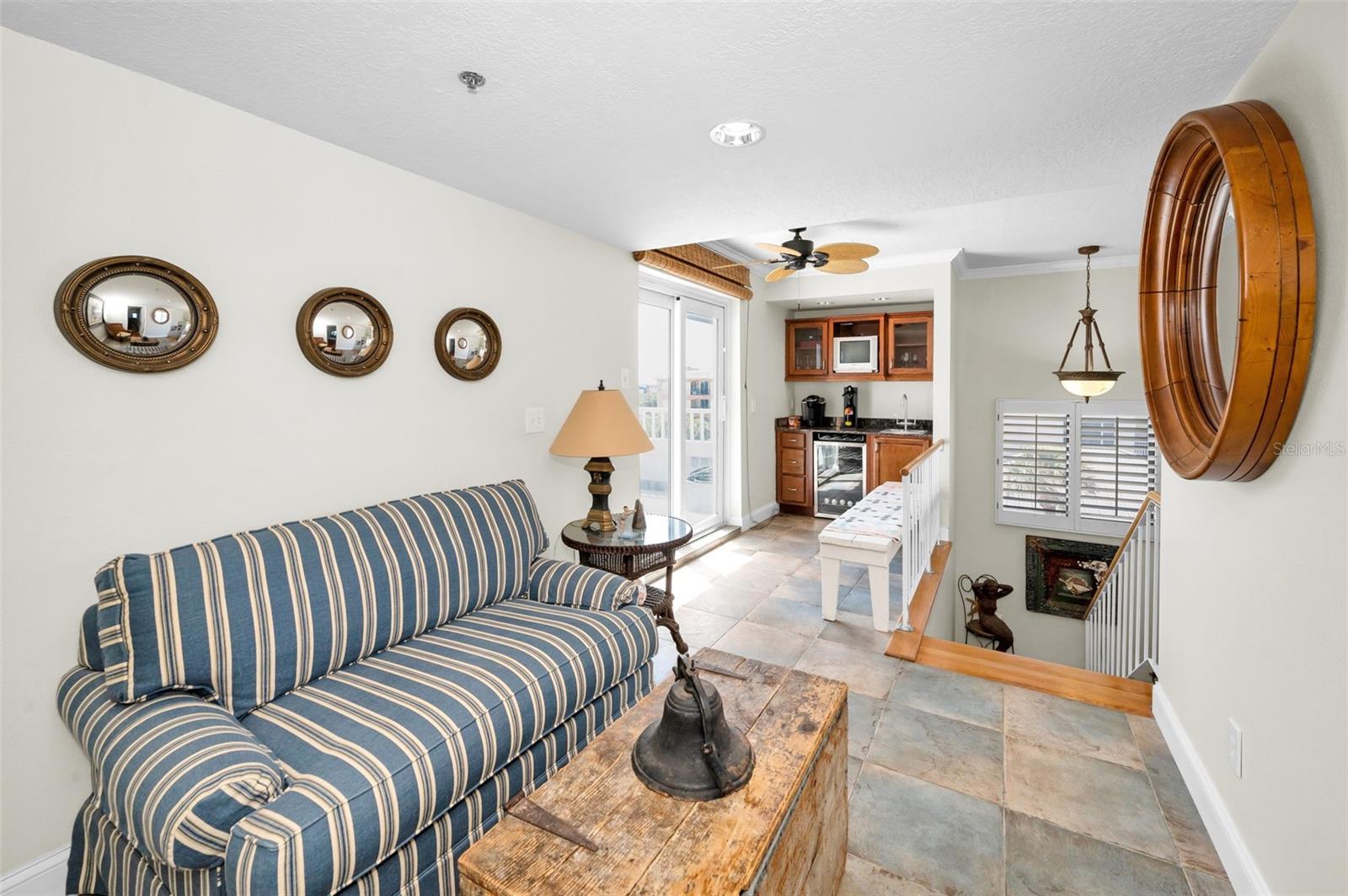 .... Parlor Room on Entry Landing - Top Floor . 22.6 X 8 Feet.  View Looking South. Wet Bar in South Corner By Roof Top Entry Sliders - Wet Bar was Perfect Addition By Owners Making Entertaining on Roof Top Deck a Breeze.