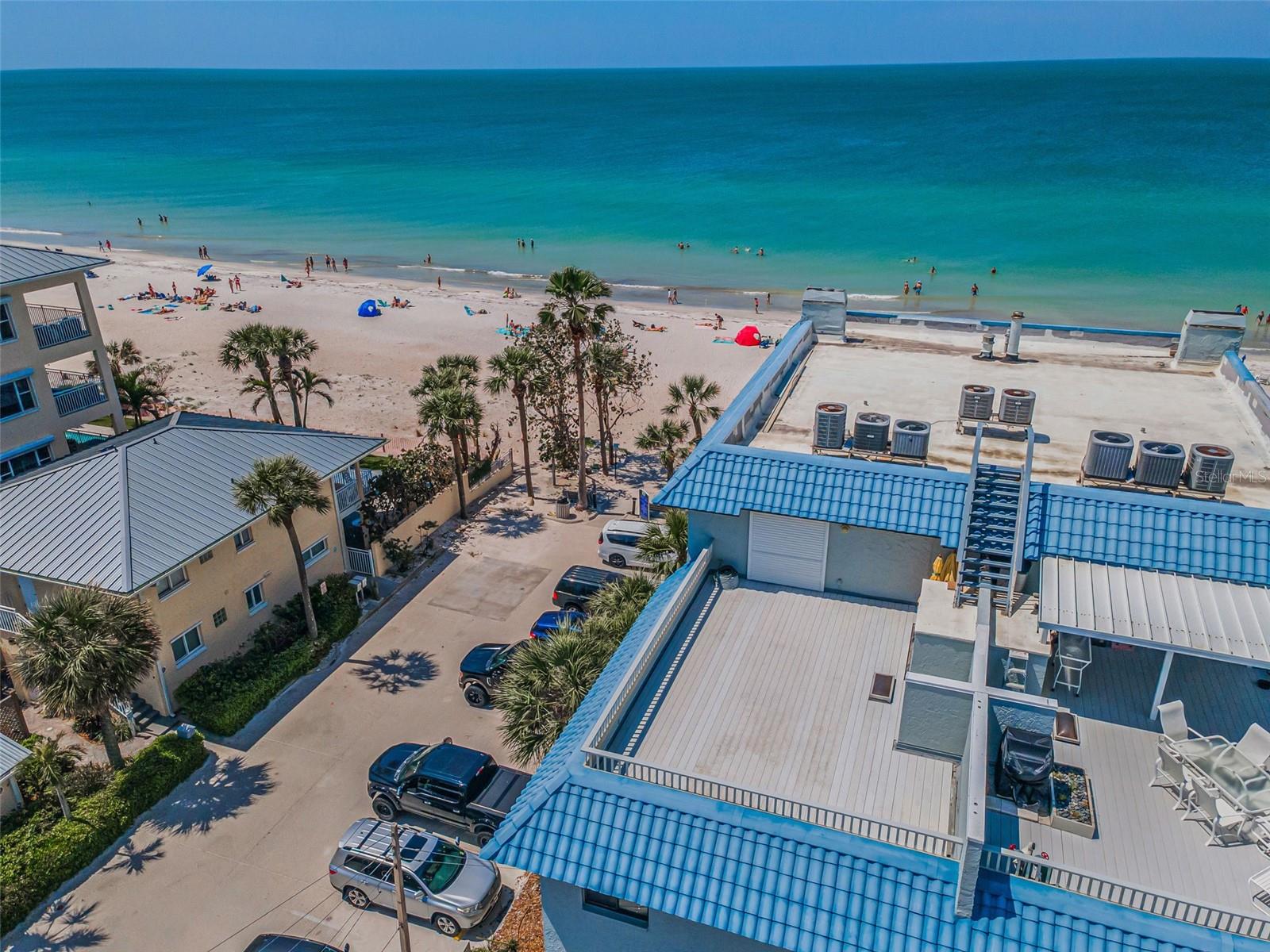 .. Rooftop Patio Enjoys Views Both East & West .. You  can see Sunrise - Sunsets - Gulf Blvd Parades or And Beach & Gulf Views. Nice Aerial of Complex Highlighting Private Rooftop Patio With  Beach Views from SW Corner PH. Rooftop