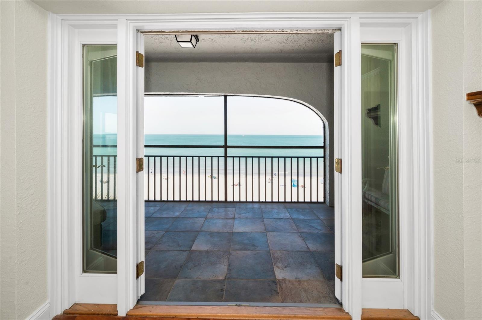 ... Master Bedroom Doors Swing Out. Electric Storm Shutters on Outside.. Bay Window on Inside South Wall With Additional Long Range Gulf Views.