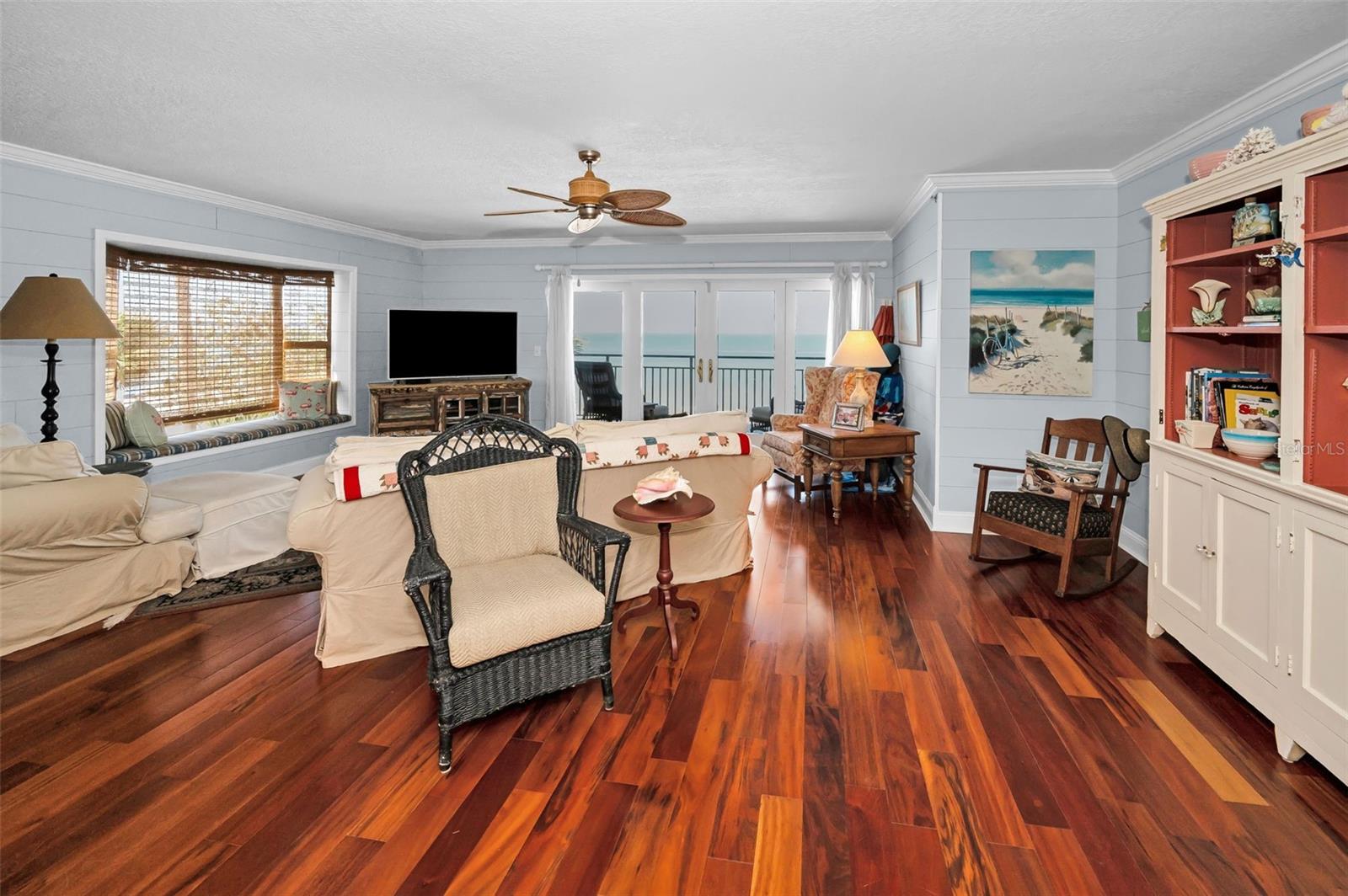 .. Shot of Gulf Front Balcony From Right Side of  29 X 21 Great room. Ceiling Crown Molding & Trim Thru Out Home