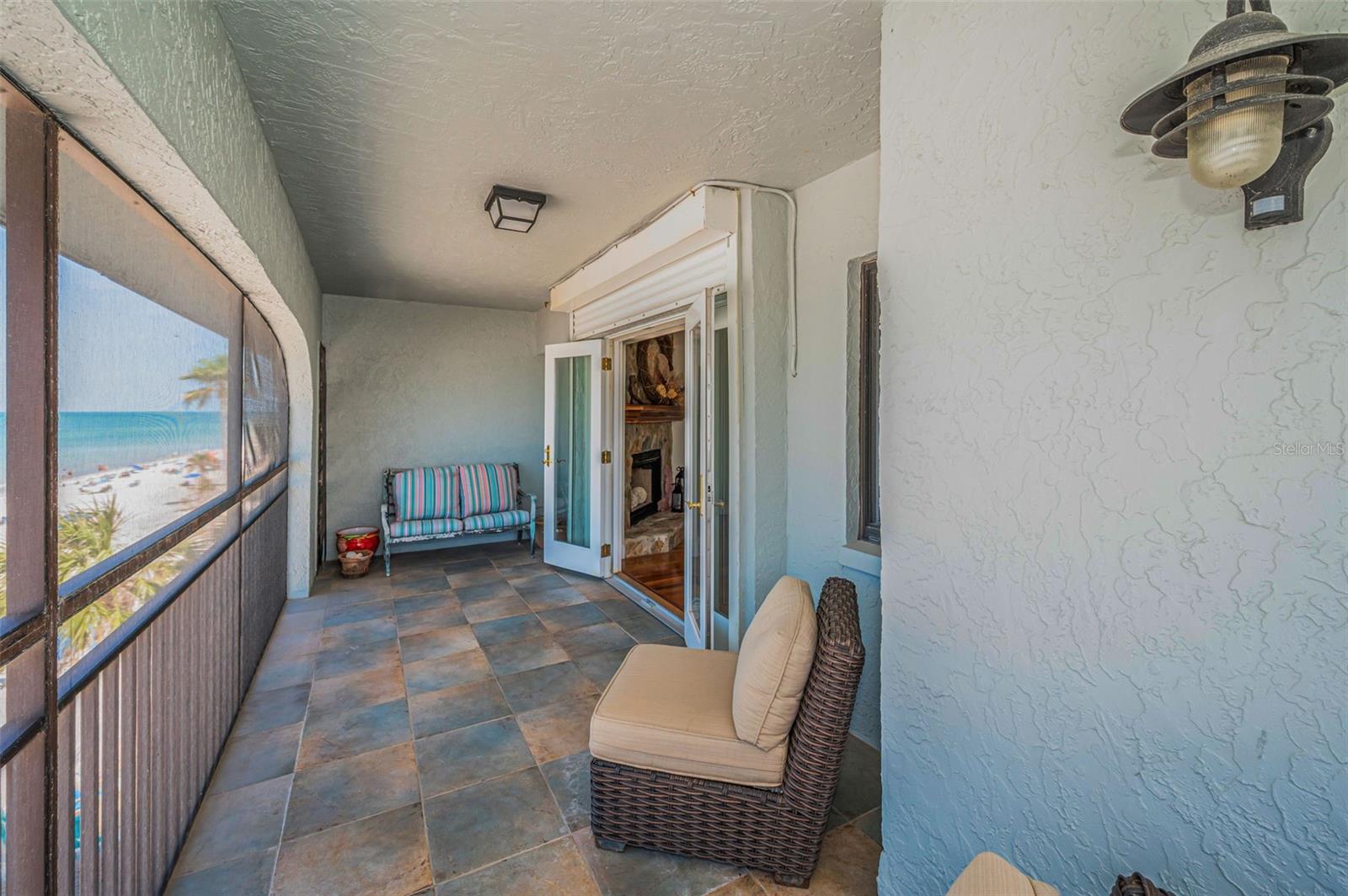 .. PH Balcony Top Floor Master Suite Balcony 21' X 7' ..  View of Fireplace Right Inside Doors on North Wall.