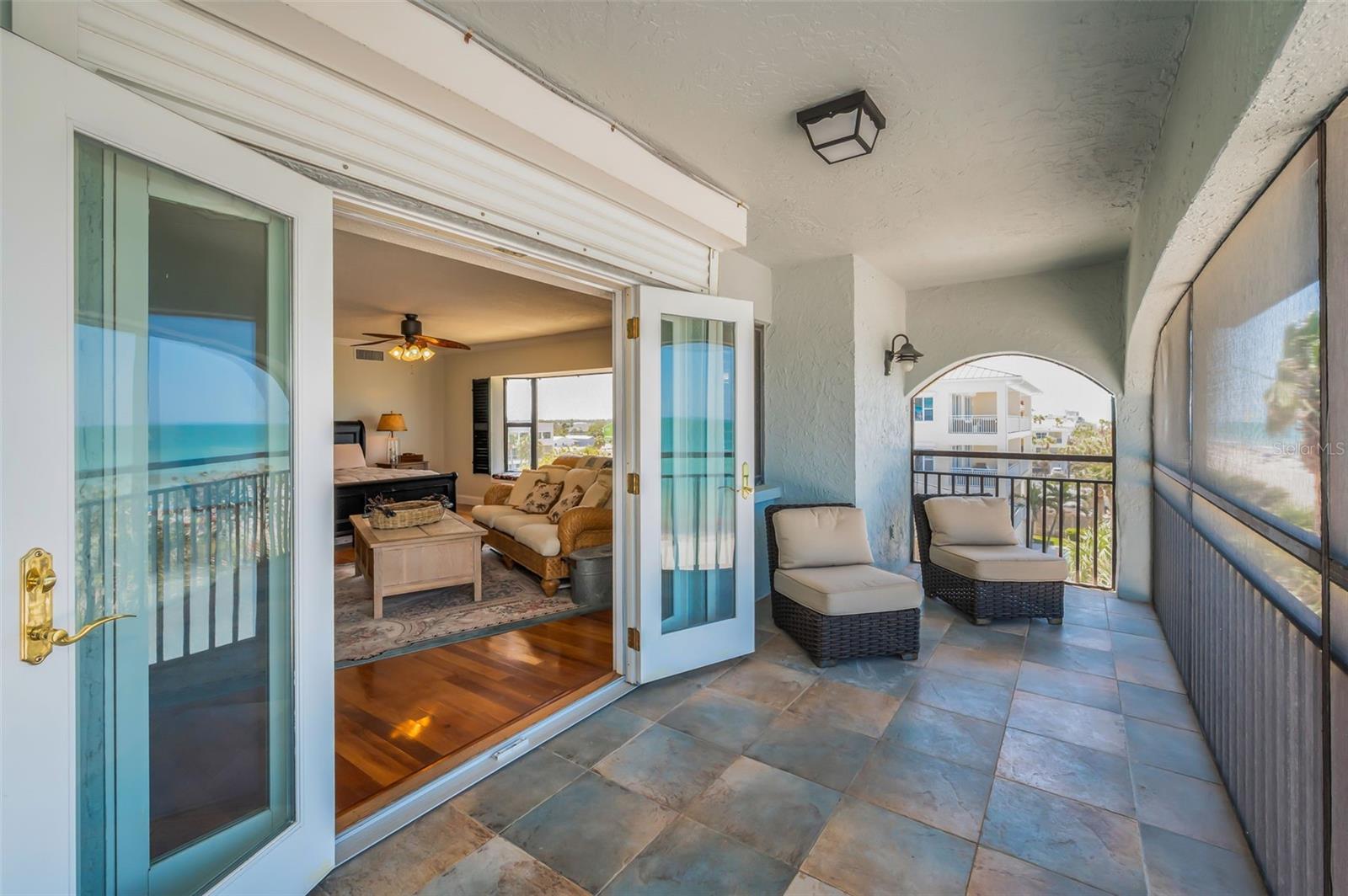 .. Penthouse Master Bedroom Balcony Looking In Towards South Side... Balcony 22.7 x 7.. Out Swing Doors - Hurricane Shutters.