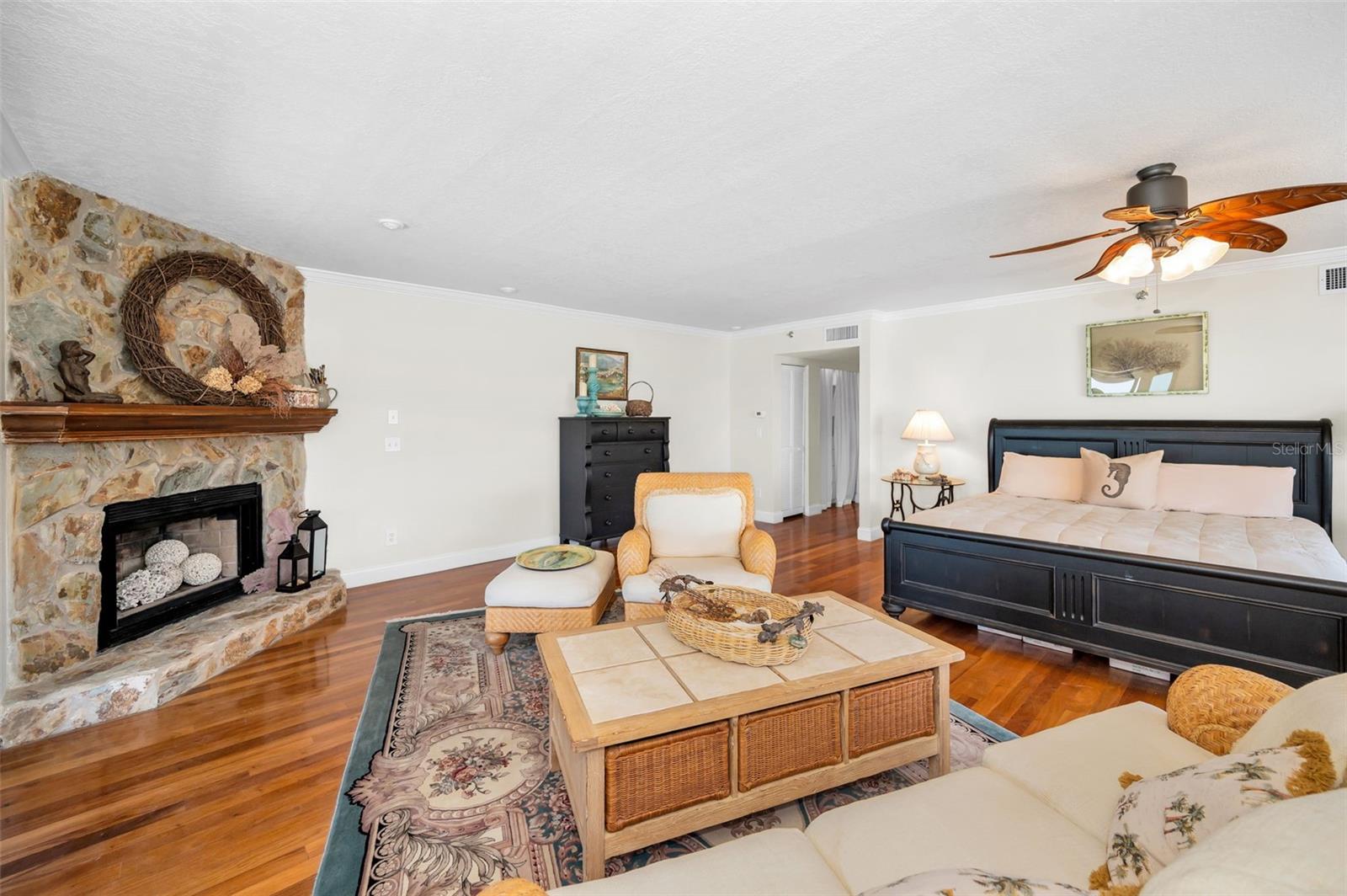 ... Looking Back Into Master Bedroom Suite. Fireplace Gives Room a Real Formal Look.
