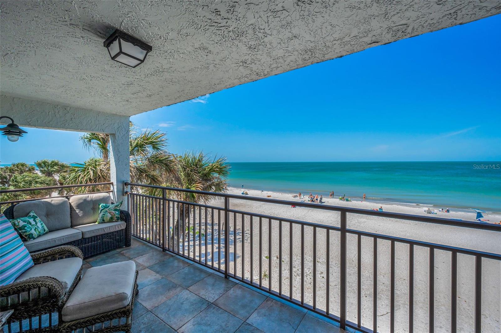 ... Balcony Shot.. Both Levels Enjoy a Gulf Front Balcony.  View Looking a Little South From This SW Corner Unit.