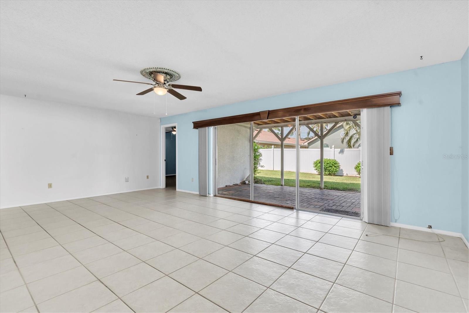 Family Room looking out to Back Patio and Backyard
