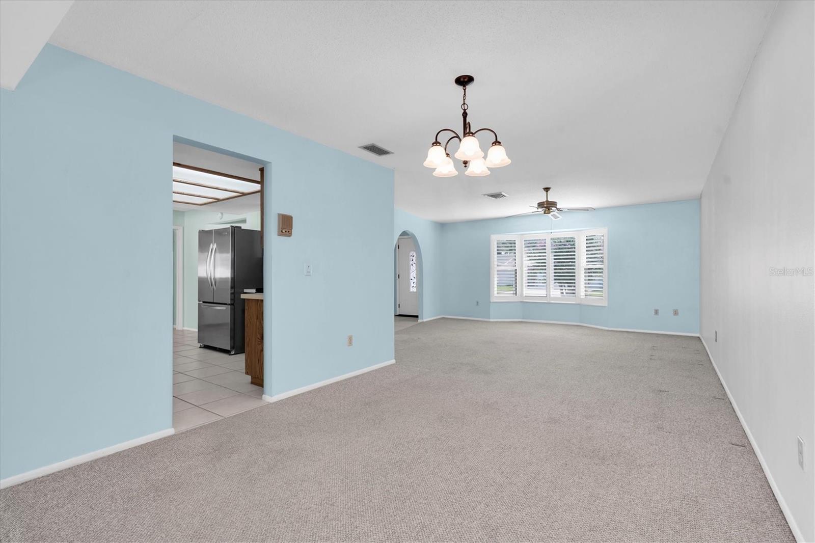 Dining Room looing into living room and doorway to kitchen