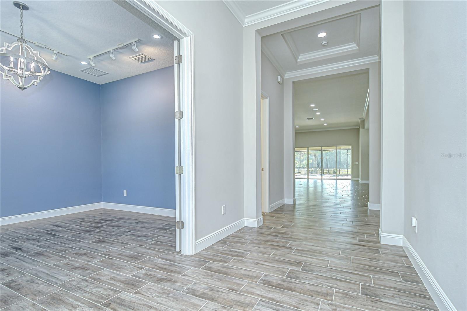 Soaring Ceilings & Elegant Detailing greet you!