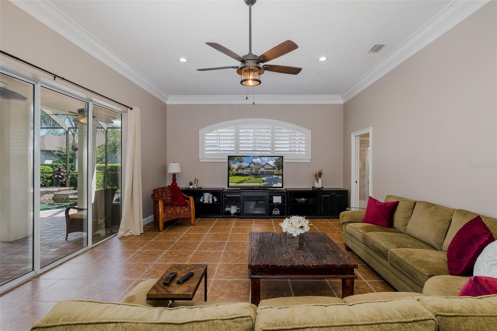Family room with sliders to the POOL!