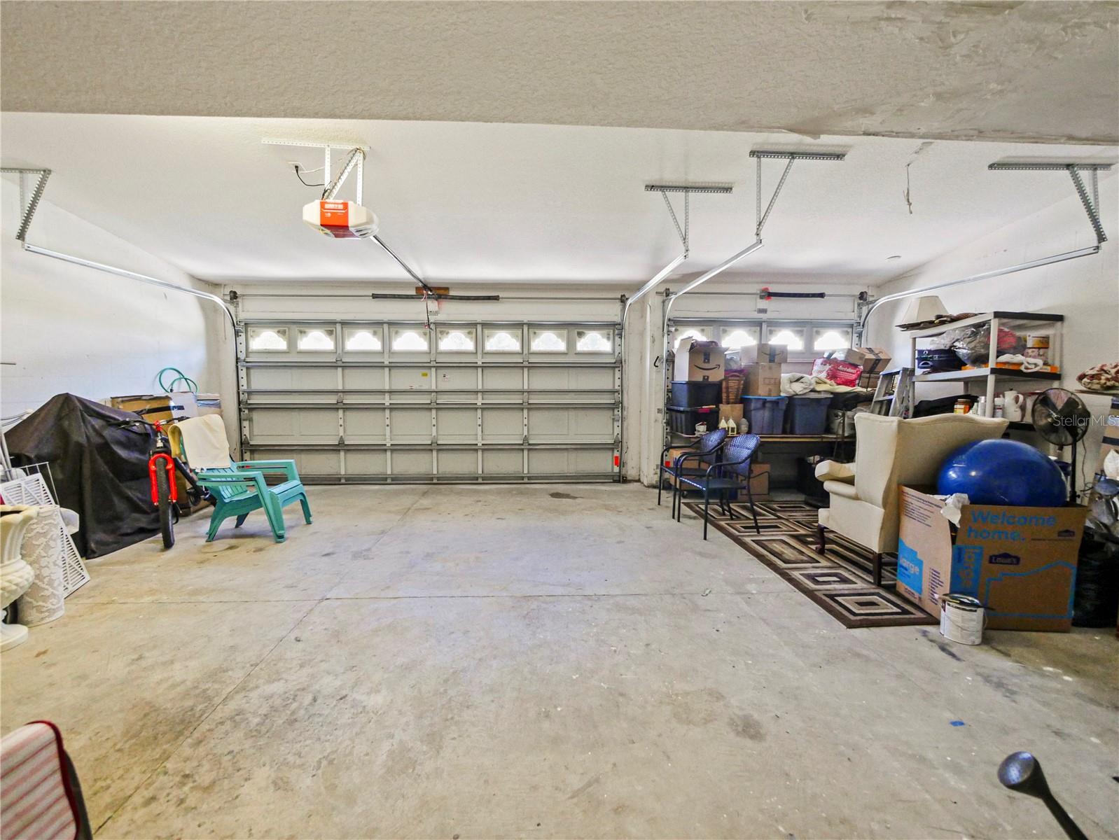Laundry Room with entrance to 3 car garage