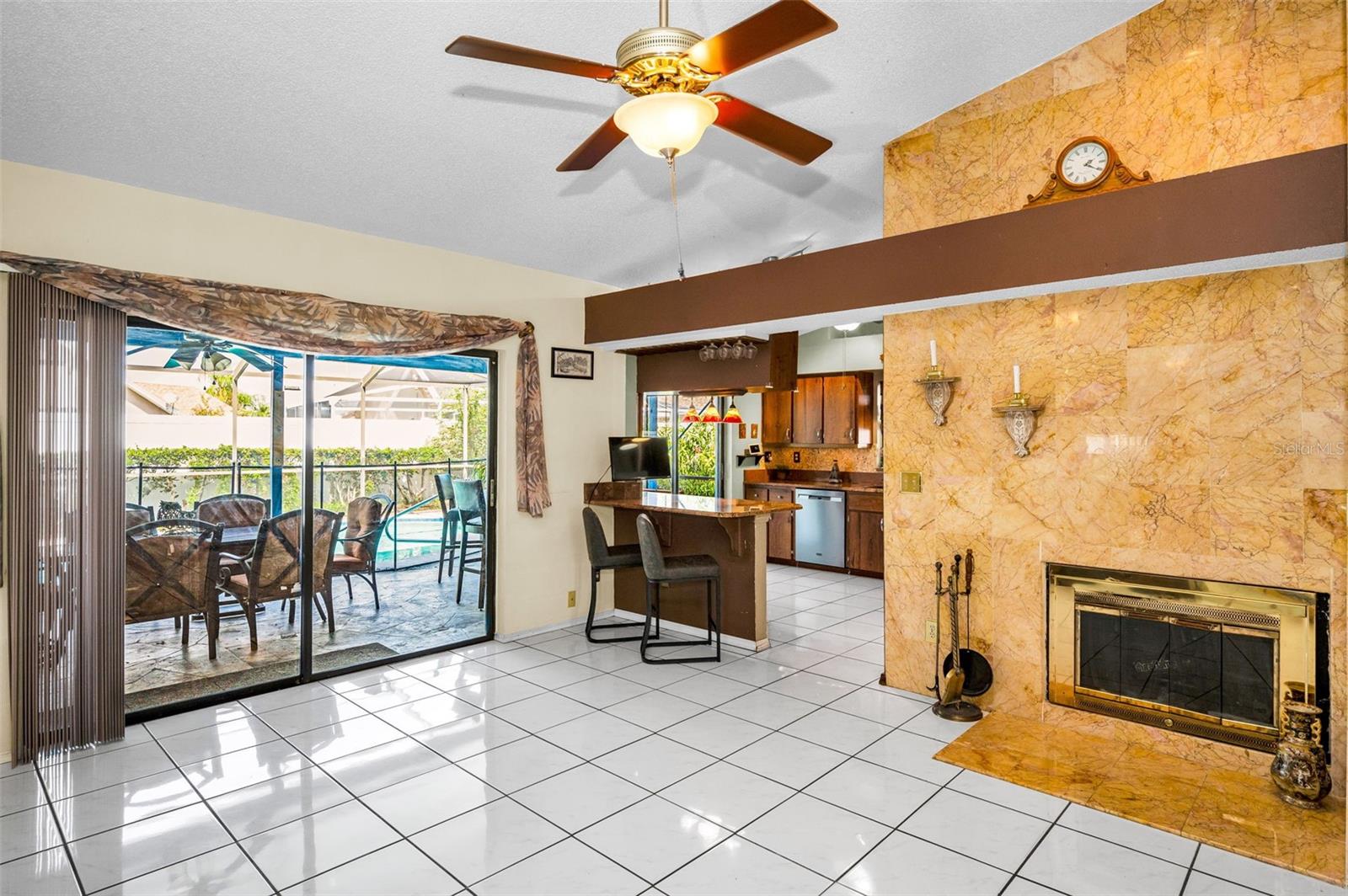 FAMILY ROOM W/WOOD BURNING FIREPLACE